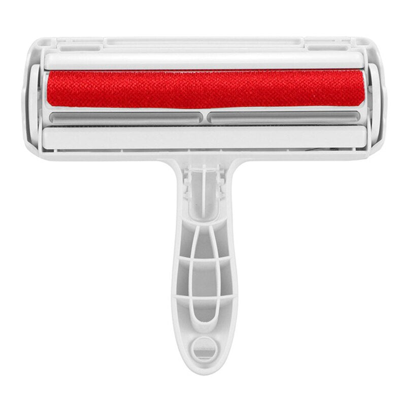 Reusable two-way pet hair roller on a sofa