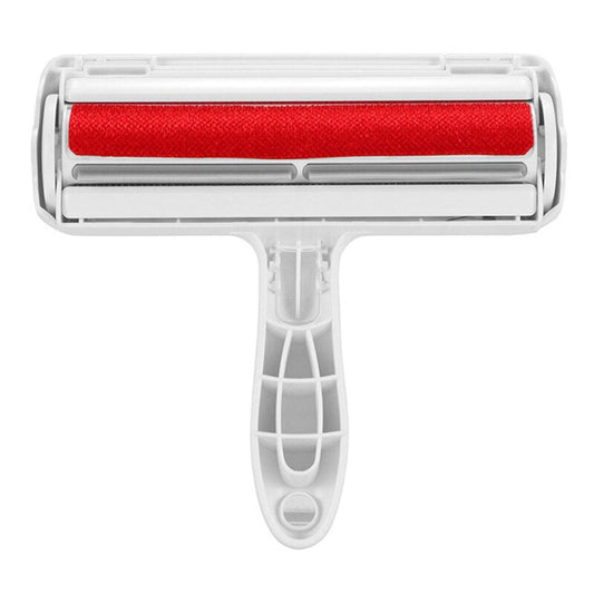 Reusable two-way pet hair roller on a sofa